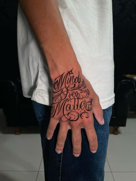 Mind Over Matter Tattoo Design, Hand Tattoos For Guys Words, Traps Tattoo Men, Trap Tattoo Ideas, Writing On Hand Tattoo, Hand Tattoo Lettering, Gangsta Tattoos Men Design, Gangsta Style Tattoo, Hand Tattoos For Guys Men