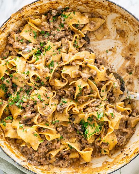 One Pot Beef Stroganoff is a simple weeknight meal. With mushrooms and beef in a creamy rich sauce with egg noodles, this dreamy dish is packed full of flavor and yumminess. #beefstroganoff #onepot One Pot Beef Stroganoff, Pasta Meatballs, Easy Ground Beef Stroganoff, Easy Comfort Food Dinners, Ground Beef Stroganoff, Jo Cooks, One Pot Dinners, Potted Beef, Stroganoff Recipe