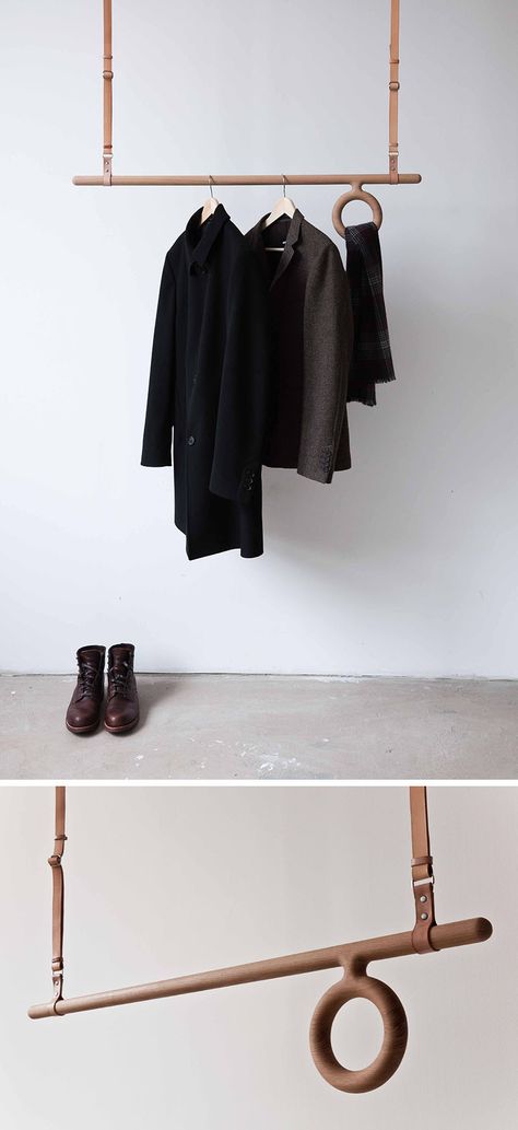 Interior Design Idea - Coat Racks That Hang From The Ceiling // This adjustable wood and leather coat rack has a wood rod acting as a place to hang coat hangers from and a circular wood offshoot that offers a home for your scarves or belts. Diy Coat Rack, Diy Coat, Hanging Coat Rack, Diy Wardrobe, Copper Diy, Hanger Design, Hanger Rack, Coat Racks, Coat Stands