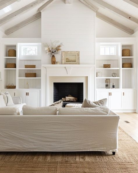 This living room totally captures the modern farmhouse vibe I love! With its vaulted ceilings and shiplap walls, it feels open and airy, but still super cozy. The built-in shelves around the fireplace? Such a great way to add a personal touch with your favorite decor, while keeping everything organized. I’m all about the mix of soft neutrals and textured accents that give the space warmth without feeling cluttered. Plus, with those big windows letting in all that natural light, it’s the perfe... Built In Shelves Living Room Fireplace With Windows, Living Room Decor Vaulted Ceiling, Built In Tv Wall Unit Vaulted Ceiling, Vaulted Ceiling Living Room Tv Wall, Fireplace With Built Ins On Both Sides Vaulted Ceiling, High Vaulted Ceilings Living Room, Fireplace Built Ins With Windows, Vaulted Ceiling Built Ins, Fireplace With Vaulted Ceiling