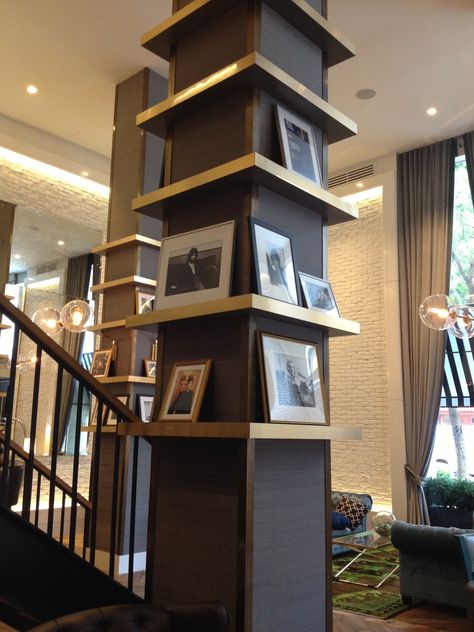 Shelves surround column, photo display...love Pillar Design Interior Modern, Columns In Living Room, Column In Living Room, Column Design Interior, Pillar Design Interior, Column Decoration Ideas, Interior Pillars, Columns Interior, Column Cladding