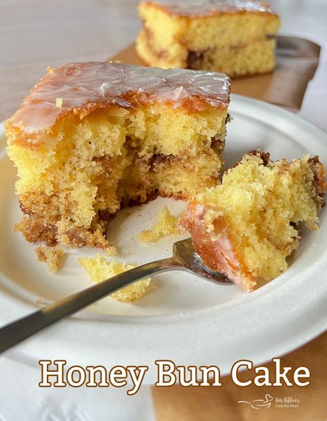 This Honey Bun Cake could very well be a new family favorite! A moist yellow cake, with a deliciously sweet brown sugar and cinnamon swirl, topped with a vanilla glaze. This super easy cake starts with a boxed yellow cake mix and gets its moisture from the addition of sour cream. So good, you'll want to eat it for breakfast! Yellow Cake Mix Desserts, Honeybun Cake Recipe, Honey Bun Cake Recipe, Bun Cake Recipe, Yellow Cake Mix Recipes, Betty Crocker Cake Mix, Honey Bun Cake, Moist Yellow Cakes, Betty Crocker Cake