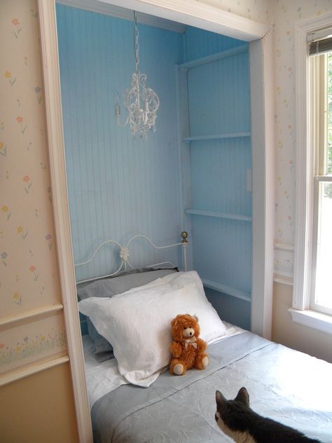 I put the head of the bed inside what used to be the closet with beadboard and small shelves on the wall. I don't need a closet in this room and putting the bed into this space makes this small room feel larger. Bed Half In Closet, Head Of Bed In Closet, Twin Bed In Closet Ideas, Closet Nooks For Kids, Bed Inside Closet, Closet Bed Nook, Bed Inside Closet Ideas, Head Boards Ideas, Shelves On The Wall