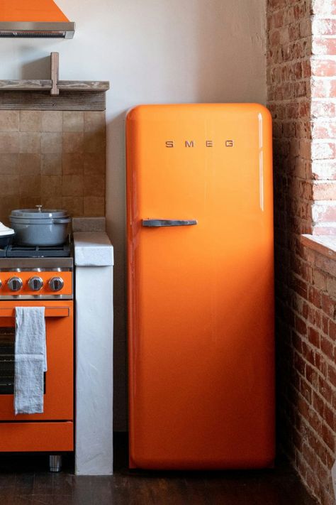 The iconic Smeg 50's retro aesthetic FAB fridge. With an incredible colour-popping range of hues and variety of sizes - you can find the perfect match to suit your style and elevate your space.

#AtHomeWithSmeg #SmegFridge #SmegColourfulFridge #OrangeKitchen Orange Smeg Fridge, Smeg Fridge Aesthetic, Smeg Fridge Kitchen, Contempary Kitchen, Colourful Fridge, Smeg Green, Colored Fridge, Smeg Aesthetic, Orange Fridge