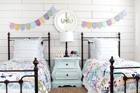 white-plank-wall-girls-bedroom White Plank Walls, Couple Room, Two Twin Beds, White Shiplap Wall, Colorful Bedding, French Country Bedrooms, Plank Walls, Twin Beds, Cottage Bedroom