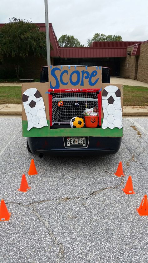 Soccer trunk or treat for preschool Soccer Theme Trunk Or Treat, Trunk Or Treat Soccer Theme, Sports Themed Trunk Or Treat Ideas, Sports Theme Trunk Or Treat, Trunk Or Treat Sports Theme, Soccer Trunk Or Treat, Sports Trunk Or Treat Ideas, Soccer Trunk Or Treat Ideas, Hockey Trunk Or Treat