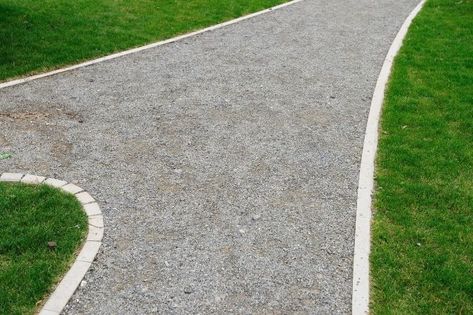 In the world of landscaping, edging is a process by which stones, bricks or blocks are placed along the edge of a driveway to prevent pebbles and other debris Building A Brick Wall, Landscaping Edging, Gravel Drive, Driveway Edging, Crushed Limestone, Wood Edging, Stone Driveway, Gravel Driveway, Lawn Mower Blades