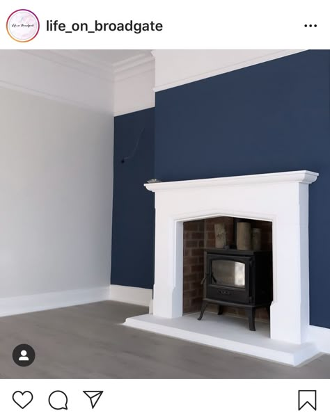 White Fireplace Blue Wall, Navy Accent Wall Living Room Fireplace, Blue Walls White Fireplace, Blue Wall White Fireplace, Navy Accent Wall Fireplace, Navy Chimney Wall, Dark Blue Living Room Accent Wall, Coloured Fireplace, Dark Blue Fireplace Wall