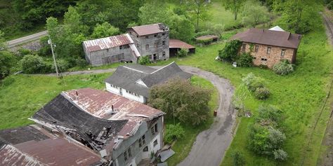 There is no history about this property, but it sits desolate along a railroad and a two-way road. If these walls could talk, what would they say? Towns In West Virginia, Abandoned Towns, West Virginia Travel, West Virginia History, Eerie Places, Abandoned Town, Virginia History, Abandoned Property, Old Abandoned Houses