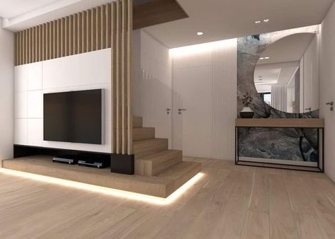 Stairs Behind Wall, Stairs Behind Tv Wall, Tv Staircase Wall, Under Stair Tv Unit Design, Tv Wall Design Under Staircase, Tv On Staircase Wall, Tv Under Stairs Living Room, Living Room With Stairs Layout, Tv Under Stairs