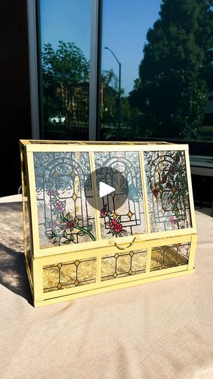 2.4M views · 446K reactions | Stained glass is having a moment rn and if you don’t have the skills to cut and solder glass, then this is a fun alternative with all the same vibes! When I saw this IKEA hack on Pinterest from @entertainidea, I just HAD to make it and y’all, this greenhouse looks so unique and brings in so much color to my patio. 10/10 would recommend to try it as a summer DIY! 🦋🪻🌷 | tina le mac 🌙 | DIY + home | Billie Eilish · CHIHIRO Stained Glass Ikea Greenhouse, Ikea Stained Glass Greenhouse, Stained Glass Greenhouse Diy, Ikea Greenhouse Hack, Diy Home Decor Projects Creative Ideas, Stained Glass Greenhouse, Diy Faux Stained Glass Window, Diy Stained Glass Projects, Faux Stained Glass Diy