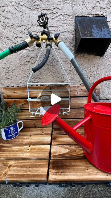 Erin Berkyto | 🪴Garden Fresh Inspiration🪴 on Instagram: "The easiest outdoor project you never knew you needed! 🤯👇

I only have one outdoor hose bib, so I need to get creative.

💡I came up with this idea because I was tired of tracking dirt inside the house.

🛀🫧I can wash my hands, feet and shoes at my new washing station. 

I can also wash my tools and fill my watering cans!

🤯 Now that I’ve added it, I don’t know how I ever lived without it!

🛍️Here’s what you’ll need 
- Four outdoor floor tiles 
- A short length of hose
- Hose splitter with three or four branches 
- A wire shower rack 
- Biodegradable soap 
- Nail scrubbers

🌸🧼Just remember to use a natural biodegradable soap. I’m using even has wildflower seeds to help with exfoliation. 

🎧I didn’t intend for this video to Outside Faucet Ideas, Biodegradable Soap, Outdoor Floor Tiles, Washing Station, Hose Splitter, Shower Rack, Hand Washing Station, Fireplace Garden, Outdoor Cleaning