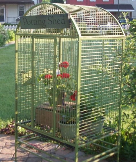 Huge Fresh Green Vintage Bird Cage on Wheels repurposed for plant display on porch or in garden. $175.00 Big Bird Cage, Garden Lighting Design, Tiki Tiki, Vintage Bird Cage, Plant Display, Garden Idea, Herb Planters, Birdcages, Vintage Inspired Decor