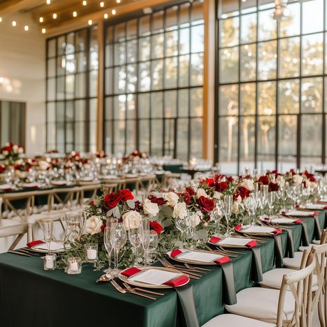 This breathtaking wedding reception setup perfectly blends deep forest green and ruby red tones for a sophisticated and romantic ambiance. The tables are adorned with lush greenery, cascading floral arrangements of red and ivory roses, and gold accents that elevate the luxurious feel. Elegant candlelight and floor-to-ceiling windows create a warm and inviting atmosphere, making this venue a stunning setting for an unforgettable celebration. ✨🌿🌹 Ruby Red Wedding, Red Wedding Receptions, Wedding Reception Setup, Romantic Ambiance, Deep Forest Green, Ivory Roses, Breathtaking Wedding, Floor To Ceiling Windows, Deep Forest