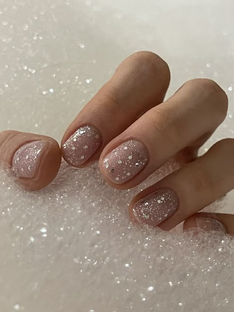 15 Short Winter Nail Ideas for 2023-2024 - thepinkgoose.com Glitter At Base Of Nail, Glitter Wedding Nails Short, New Year Nails Short Simple, Short Glitter Nails Sparkle, Clear Nails With Silver Glitter, Natural Festive Nails, Short Sparkly Nails Acrylic, Short Nails Ideas Shellac, Small Nails Glitter