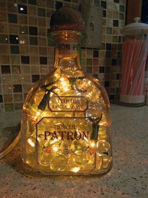 Silver Patron and Fireball Whiskey Lighted Bottles by Ruth | How to Make A Bottle Lamp Repurpose Bottles, Patron Bottle Crafts, Whiskey Bottle Crafts, Diy Whiskey, Liquor Bottle Lights, Concrete Pedestal, Lighted Bottles, Empty Liquor Bottles, Alcohol Bottle Crafts