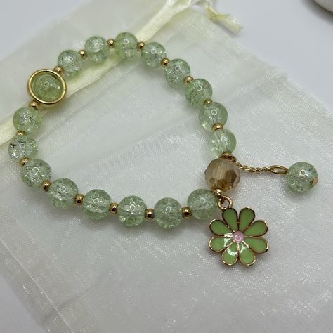 Crackle Glass Beaded Enamel Flower Stretch Bracelet Mint Green. Dust Bag Included. Nwot Crackle Glass Bead Bracelet, Crackle Beads Bracelet, Sage Green Bracelet, Mint Green Bracelet, Green Charms, Green Bracelet, Mint Green Color, Crackle Glass, Green Outfit