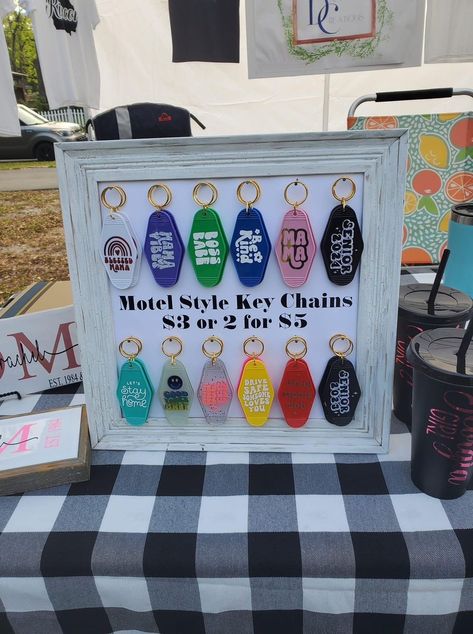 How To Display Cups At Craft Fair, Vendor Product Ideas, Pop Up Shop Ideas To Sell, How To Display Car Decals At Craft Show, Keychain Craft Show Display, Vinyl Items To Sell At Craft Fair, Craft Fair Keychain Display, Things To Sell At Vendor Fairs, How To Display Signs At Craft Show