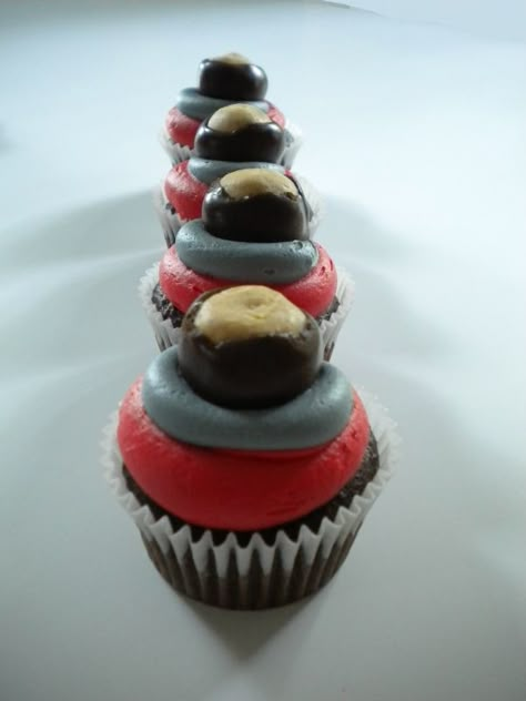 Buckeye Cupcakes  **These were a huge hit...everybody loved them...the grey icing however...was a bit tough, I used the black and mixed it with a tub of white, it seems to have a lavender tint....none the less...cute! Amy** Buckeye Cupcakes, Ohio State Cake, Ohio State Wedding, Ohio State Party, Buckeye Cake, Buckeye Baby, Osu Football, Ohio Buckeyes, Buckeye Nation