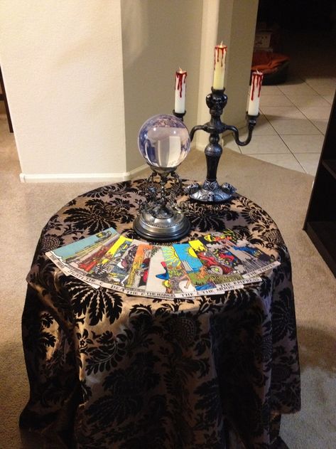 gypsy fortune telling halloween party | Halloween Fortune Teller table Fortune Teller Decor, Fortune Teller Table, Halloween Mantles, Adult Halloween Party Food, Fortune Teller Halloween, Halloween Fortune Teller, Adult Halloween Party Decorations, Diy Halloween Dekoration, Pumpkin Lanterns