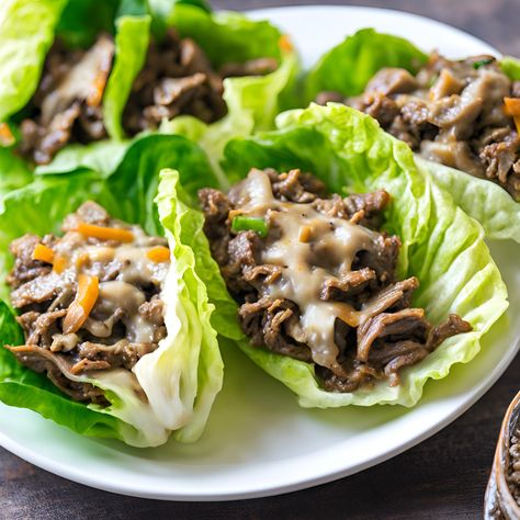 Philly Cheesesteak Lettuce Wraps Philly Cheesesteak Lettuce Wraps, Philly Cheese Steak Lettuce Wraps, Steak Lettuce Wraps, Lettuce Wraps Healthy, Steak Dinners, Philly Steak, Slow Cooker Lamb, Man Cooking, Philly Cheese