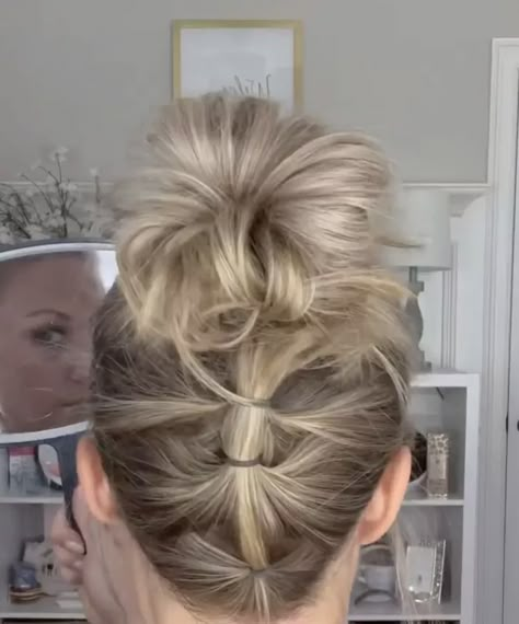 Hi all! My name is Mandy Sims and I am new to Upstyle. I love sharing simple hair style hacks, makeup hacks and beauty tips. Today I am sharing an amazing easy to replicate hair updo.For this you’ll need the following: 1 claw clip 3 small rubber bands 1 medium/large rubber band Before we get started, be sure to follow me on my other social media pages!Follow me on Instagram @mandysimsFollow me on TikTok @mandy.sims Step one:Section off a small section of hair at the bottom and… Hair Styles Using Small Rubber Bands, Small Rubber Band Hairstyles, Hair Styles With Rubber Bands, Rubber Band Hairstyle, Long Hairstyle Ideas, Messy Bun For Short Hair, Rubber Band Hairstyles, Hacks Makeup, Bob Hair Color