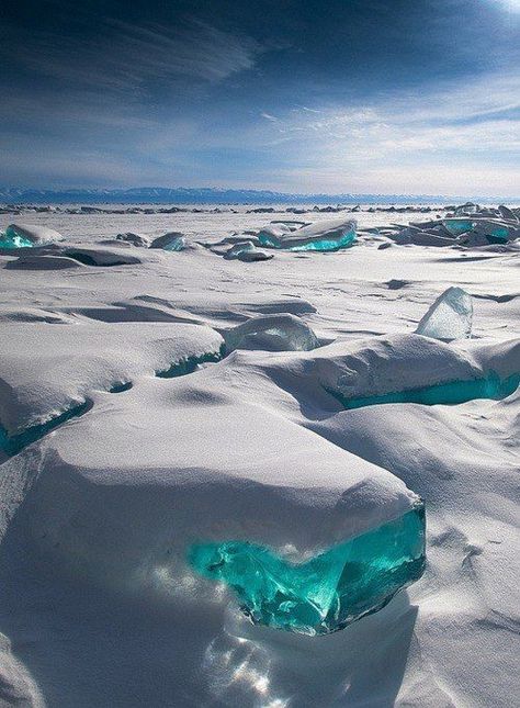 “In March, due to a natural phenomenon, Siberia’s Lake Baikal is particularly amazing to photograph. The temperature, wind and sun cause the ice crust to crack and form beautiful turquoise blocks or ice hummocks on the lake’s surface.” Photograph by  Alexei Trofimov Ice Land Aesthetic, For Emma Forever Ago, Ice Land, Lake Baikal, Image Swag, Wallpaper Tumblr, Lake Pictures, Hard Water, Natural Phenomena