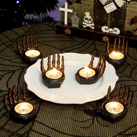 PRICES MAY VARY. MATERIAL: These set of 6 ghost hand tealight candle holders are made of resin with white painted in surface, heavy enough, is best candle centerpieces for tables. PERFECT SIZE: These skeleton hand tea light candle holders measures 2.2" W x 2.2" H, ideal for any counter top or table. These Halloween candle holders are perfect Halloween table decorations for home, indoor, office, living room, kitchen, balcony, party. Enjoy the holiday season with these Halloween ghost hands. CANDL Halloween Candle Holder, Tea Light Candle Holders, Halloween Candle, Skeleton Hand, Halloween Home, Light Candle, Table Decoration, 6 Pack, Tea Light Candle