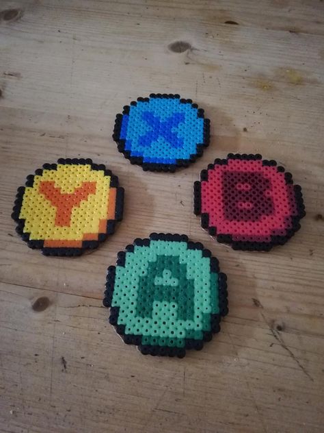 Mini gaming button coasters handmade hama beads x b a y | Etsy Perler Creations Coasters, Game Controller Perler Beads, Melting Beads Coaster, Perler Bead Coasters Circle, Cute Perler Bead Coasters, Fuse Beads Coasters, Peeler Bead Coaster, Nintendo Perler Beads, Grunge Perler Bead Patterns