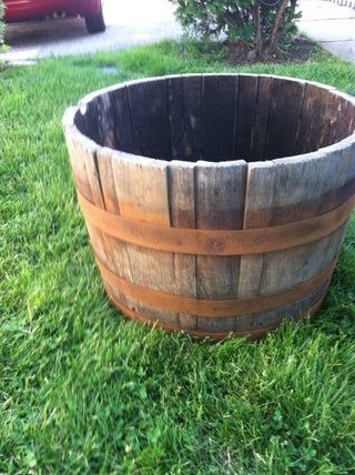 Revamping an Old Barrel Planter : 7 Steps - Instructables Wood Barrel Ideas, Wood Barrel Planters, Whiskey Barrel Planter, Outside Planters, Wine Barrel Planter, Growing Tomato Plants, Barrel Projects, Fountains Backyard, Barrel Planter