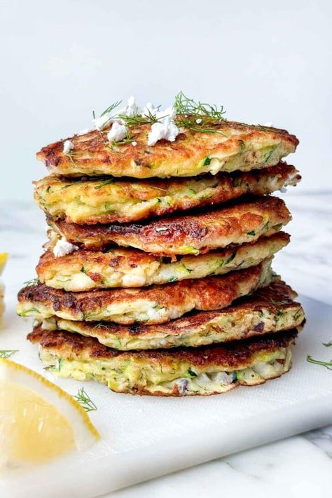 Zucchini Fritters (with Feta and Dill) | foodiecrush.com Foodiecrush Recipes, Greek Chicken Marinade, Zucchini Fritters Recipe, Autumn Recipes Vegetarian, Chicken Gyros, Zucchini Fritters, Shredded Zucchini, Foodie Crush, Tzatziki Sauce