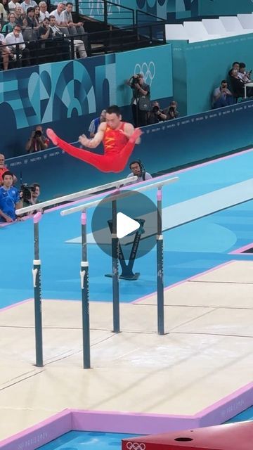 Chinese Gymnastics Team🇨🇳中国体操队 on Instagram: "SLAYYY! Zou Jingyuan has flipped and soared his way to glory, clinching GOLD in Men's Parallel Bars at the #paris2024. 6.9+9.300=16.200🥇
Follow @china__gymnastics for more videos!

Image source: 两个爸爸三个女儿
#gymnastics #gymnast #china #Paris #olympic #2024 #zoujingyuan" Parallel Bars Gymnastics, Chinese Gymnastics, Rythmic Gymnastic Aesthetic, Famous Gymnasts, Amazing Gymnastics, Gymnastics Videos, Gymnastics Team, Gymnastics Photography, Olympic Gymnastics