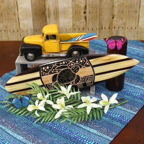 Island Spirit: Hawaiian Surf Adventure  Aloha! And welcome to our retro Hawaiian surf rendezvous!    This centerpiece, with its vibrant colors and playful theme, is versatile for any event or space that aims to evoke the carefree, adventurous spirit of the beach and surfing. Surfboard Centerpiece, Surf Theme Party Centerpieces, Surfboard Centerpieces, Surfing Centerpieces, Surf Party Table Decor, Surf Birthday Party Table, Coastal Birthday, Hawaiian Surfer, Coral Party