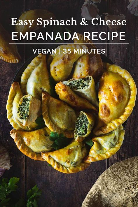 Flaky pie crust filled with fresh spinach, garlic, and ricotta cheese. These Spinach and Cheese Empanadas are an easy dinner or appetizer recipe, and best served with fresh Chimichurri sauce! | Vegan Ricotta, Empanadas with Spinach, Argentine Empanadas Spinach Empanadas, Veggie Empanadas, Cheese Empanadas Recipe, Vegan Ricotta Cheese, Vegan Empanadas, Vegetarian Empanadas, Cheese Empanadas, Hand Pies Savory, Comfort Meals