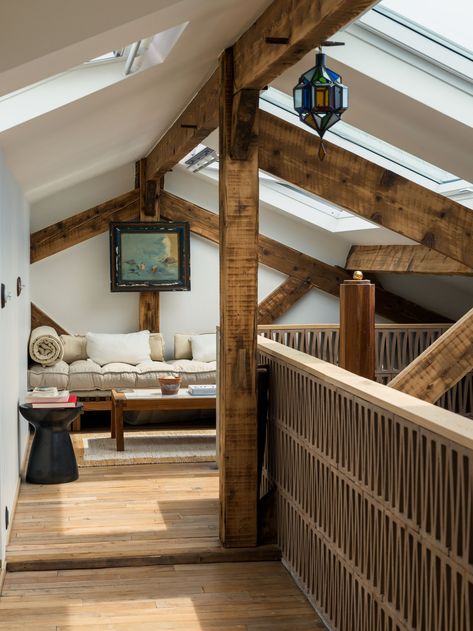 Simon Buret’s creative sanctuary Paris Loft In Paris, Cottage With Mezzanine, Cottage Mezzanine, Small House Mezzanine, Musician Loft Apartment, Mezzanine Loft, Paris Loft, Farm Door, Vintage Leather Sofa