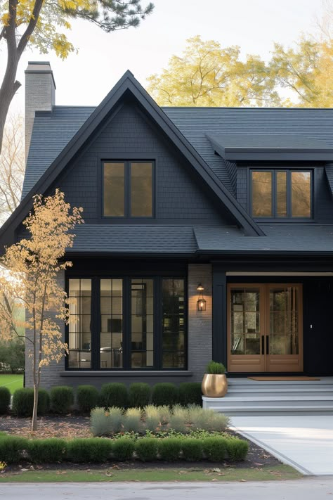 Looking for the perfect modern house paint colors? These 10 colors will add the perfect curb appeal to your home. Dark Charcoal House Exterior, Black Painted House, Black Houses Exterior, Small Black House, Black Wooden House, Exterior Black House, Dark Exterior House, Black Home Exterior, Modern House Colors