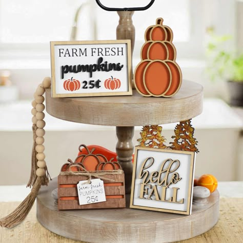 PRICES MAY VARY. Super Value Fall Decor set: The set includes 1 Hello Fall Sign, 1 Farm Fresh sign, 1 Stacked Pumpkin Sign, 1 Pumpkin Crate Sign and 1 String of Bead Garland. These take Fall cozy formula, turning everything at home pretty and bright. (Tiered Tray Not Included) Fall Natural Elegance: These wooden Fall signs offer a quick and easy way to give your home a rustic makeover, and when paired with a bead garland, they become a Fall centerpiece for home setting. Fall-themed Design: The F Wooden Fall Decor, Fall Decorations For Home, Fall Tabletop Decor, Fall Tiered Tray Decor, Fall Wood Signs, Fresh Pumpkin, Halloween Centerpiece, Pumpkin Farm, Rustic Fall Decor