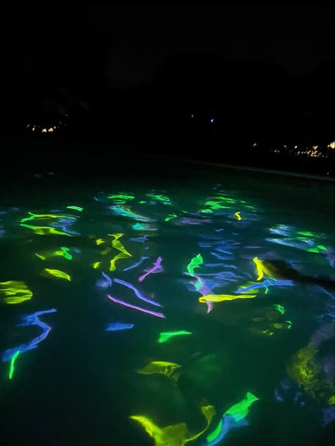 Pool Glow Sticks, Pool Party Glow Sticks, Glow Stick In Pool, Glow Sticks In The Pool, Glow Sticks Pool Party, Glowstick Party Aesthetic, Spooky Pool Party, Glow In The Dark Swim Party, Pool Party Glow In The Dark