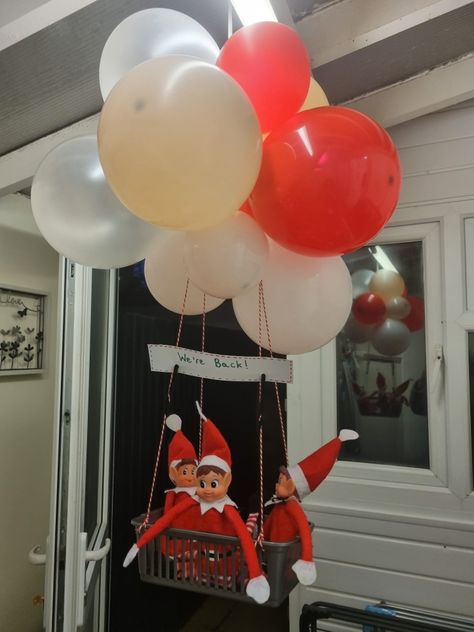 Elf on the shelf, we're back! Elf entrance. Elves arrives in hot air balloon. Elf Parachute Ideas, Balloons Elf On The Shelf, Elf Return Balloon Ideas, Christmas Mistletoe Decoration, Elf On The Shelf Club House, Elf On The Shelf We're Back, Elf On The Shelf Ideas With Balloons, Elf On Shelf Parachute, Elf On A Shelf Balloon Ideas