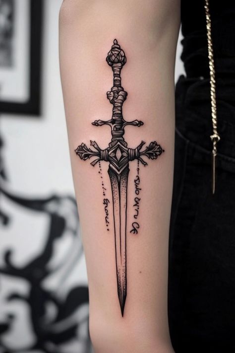 Sword tattoo with intricate details on a person's arm. Dagger Tattoo Ideas, Dagger Tattoos, Traditional Dagger, Vintage Tattoo Art, Camera Tattoos, Jewel Tattoo, Health Tattoo, Knife Tattoo, Tattoos Arm