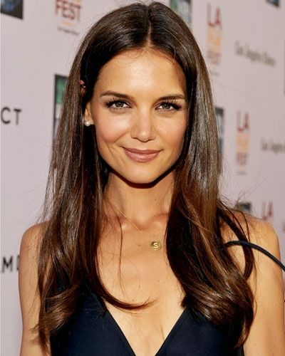 Katie Holmes' Barely There Layers. WHAT IT IS: Extra-long, chest-length hair with subtle thinning at the ends to prevent the styling from looking Marcia Brady. WHO SHOULD TRY IT: Are you that girl with long, silky hair that that dries straight with very little effort? Meet your new hairstyle. Chest Length Hair, Katie Holmes Hair, Spring Haircuts, Hair Colouring, Makeup Tip, Fall Hair Cuts, Long Brown Hair, Brown Highlights, Katie Holmes