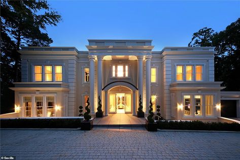 Making a grand entrance: The front of the house has pillars extending up two floors, with ... Mansion Designs, St Georges, Mansions Luxury, Indoor Swimming, Indoor Swimming Pools, Saint George, New Homes For Sale, Architect Design, Detached House