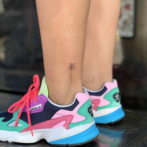 Chic Ankle Tattoos That Are Are Tiny but Mighty Tattoo Ideas With Words, Ankle Tattoo Cross, Women Tattoo Placement, Hidden Tattoo Placement, Palm Tree Tattoos, Needle Palm, Tattoo Wave, Ankle Tattoo Ideas, Tattoos For Women Meaningful