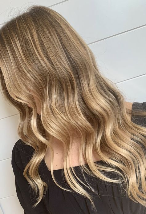 The best way to transition your blond hair color from Summer to Fall this year is by trying our new favorite hue: "Wheat Blond." Colorist Jack Howard, who works at Paul Edmonds Salon in London, gave POPSUGAR the lowdown on how to try the beautiful warm shade of blond for yourself this season.   "A fresh, wheat-colored glaze softens everything up after Summer," said Howard, who describes wheat blond as a warm, buttery hue with ribbons of gold painted throughout. "It's an anti-ash blond, perhaps a Fall Hair Color Trends, Dirty Blonde Hair, Blonde Hair Inspiration, Brown Blonde Hair, Long Blonde, Hair Colorist, Fall Hair Color, Long Blonde Hair, Hair Color Trends