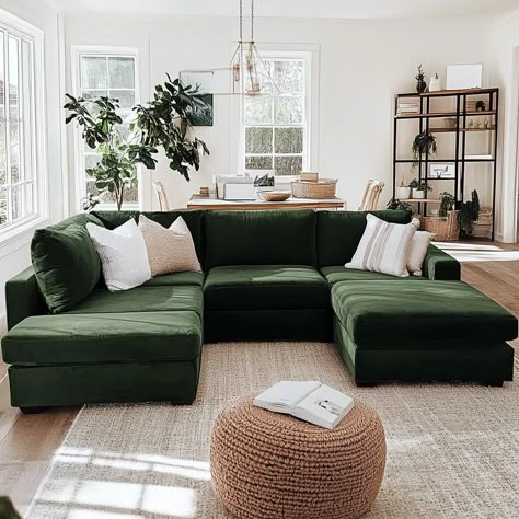 A Green Sectional Works With Any Style — Living Bright Interiors Green Sofa Lounge Ideas, Green Chaise Lounge Living Rooms, Green Sofa Living Room Modern, Dark Green L Shaped Sofa, Green Sofa Farmhouse, Olive Green Couch Living Room Decor, Apartment With Green Couch, Interior Design Green Sofa, Fern Green Sofa Living Room