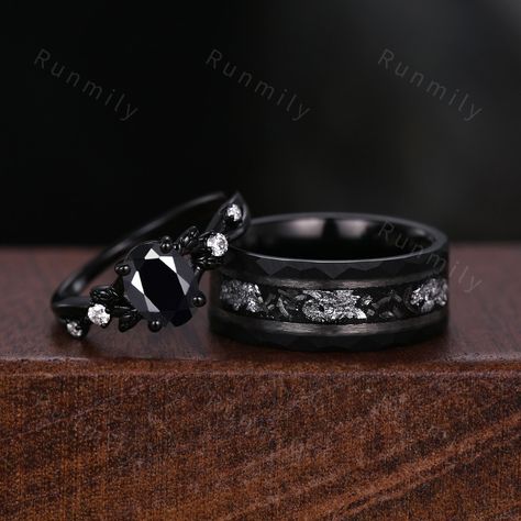 Here we have a Oval cut Black Onyx Couples Ring Set Vintage Black Gold Ring Mens Meteorite Tungsten Ring His and Hers Wedding Band Leaf Style Promise Ring ITEM DESCRIPTION ✦ Handmade, high-quality item! ✦ Material: Sterling Silver/Tungsten ►Sold as a two-piece set ►His ring is Black Gold Tungsten Carbide with meteorite and silver foil inlay. ►His band width: 8mm ►His tungsten ring will not turn green itself and will not cause your skin to turn green.  ✦ Durable - Incredibly Scratch-Resistant to Gothic Male Wedding Ring, Adjustable Black Couple Rings For Promise, Matching Gothic Wedding Rings, Gothic Black Promise Rings, Meteorite Wedding Ring Set, Couples Gothic Rings, Couples' Black Promise Rings, Black Wedding Ring Sets, Meteorite Wedding Rings