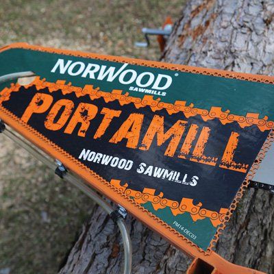 Norwood PortaMill Chainsaw Sawmill — Model# PM14 Homemade Chainsaw Mill, Chainsaw Mill, Outdoor Woodworking Projects, Epoxy Wood Table, Chainsaw Accessories, Logo Icon, Table Saw, Rustic Industrial, Wood Shop