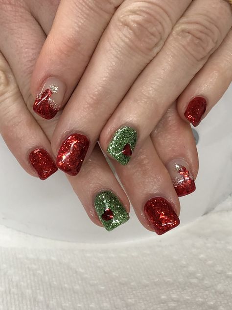 Grinch Green w Heart Santa Hat Red Glitter Christmas Gel Nails  Light Elegance Little Red Sled, Diamond & Gummy Green Grinch Nails Designs Easy, Red And Green Ombre Nails, Grinch Heart Nails, Short Grinch Nails, Red Nails With Green Glitter, Red Green Glitter Nails, Grinch Nails Designs, Grinch Nails, Red And Green Sparkle Nails