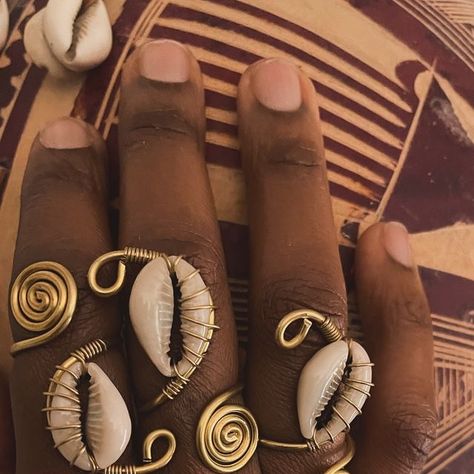 Afrisoul Goddess Cowrie Shell Jewelry on Instagram: "New Product Alert ‼️ I’m in love with these rings… Will be added to the shop tonight. 💜" Cowrie Shell Decor, Shell Rings Diy, Cowry Shell Jewelry, Ghana Nails, Aesthetic Blender, Cowrie Shell Jewelry, Wire Bending, Shell Tattoos, Diy Earrings Easy