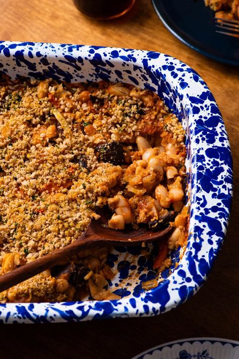 This hearty vegan cassoulet (French braised white beans) is a festive and affordable way to feed a crowd. thenewbaguette.com Vegan Chanterelle Recipes, White Bean And Mushroom Cassoulet, Traditional French Cassoulet Recipe, Sausage And White Bean Cassoulet, Braised White Beans, Vegan Cassoulet, Cozy Winter Recipes, Feed A Crowd, Vegan Beans